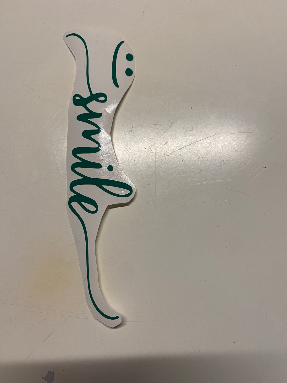 Vinyl Schriftzug „smile“ mit Smiley (3 Farben)